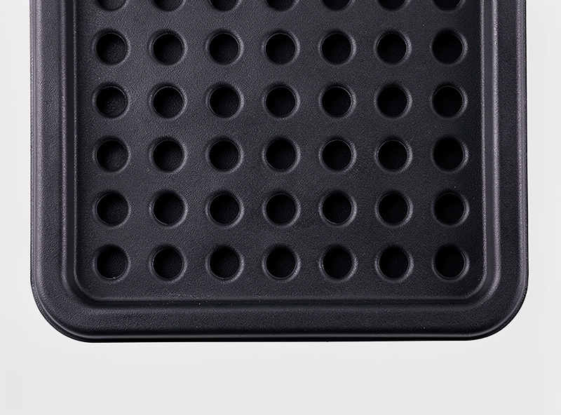 Black 1020 microgreen tray showing 36 drainage holes